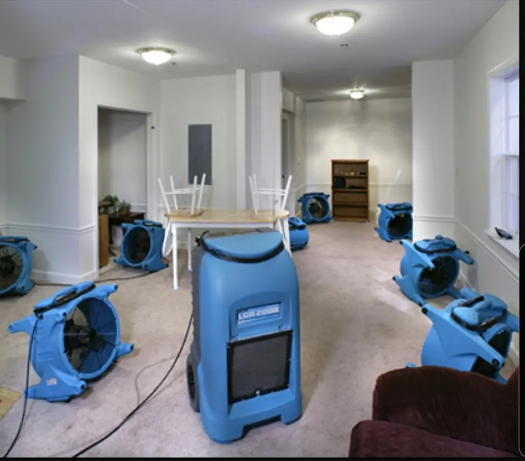 Air movers and dehumidifier setup for Water Damage Restoration in Oildale